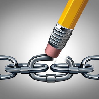 Concept of weakness and broken chain as a business symbol with metal links and a pencil eraser erasing a key connection as a metaphor for disconnecting or divorce with 3D Illustration elements.