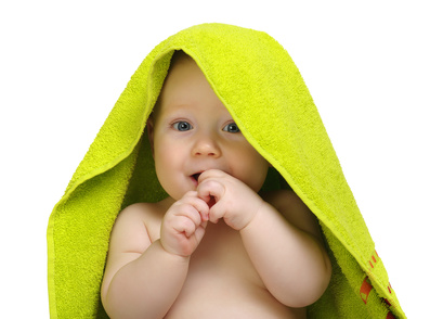 baby in towel on white background