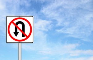 No return back road sign over blue sky blank for text